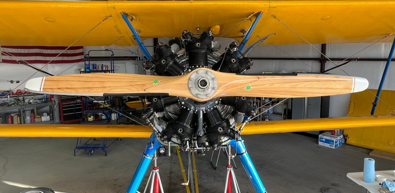 Wooden MT propeller on a Stearman radial engine in a hangar